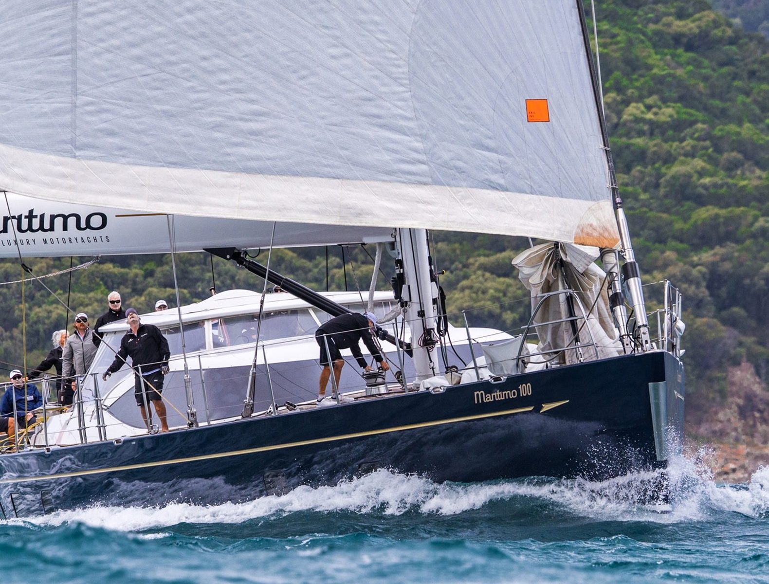 Crew aboard Maritimo 100 sailing in the Whitsundays during Hamilton Island Race Week 2026.