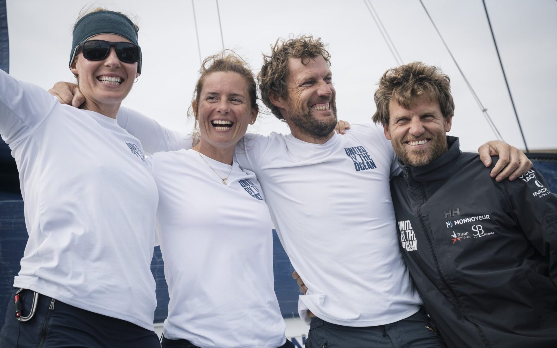 United by the Ocean crew celebrates victory in The Ocean Race Atlantic in Lorient.
