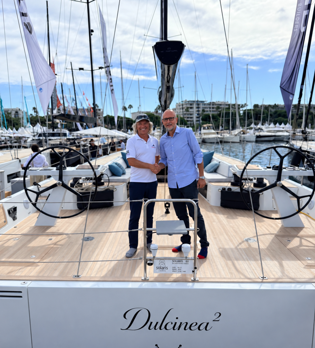 Matt Hayes and a Solaris representative aboard a Solaris 60 at the Cannes Yachting Festival.